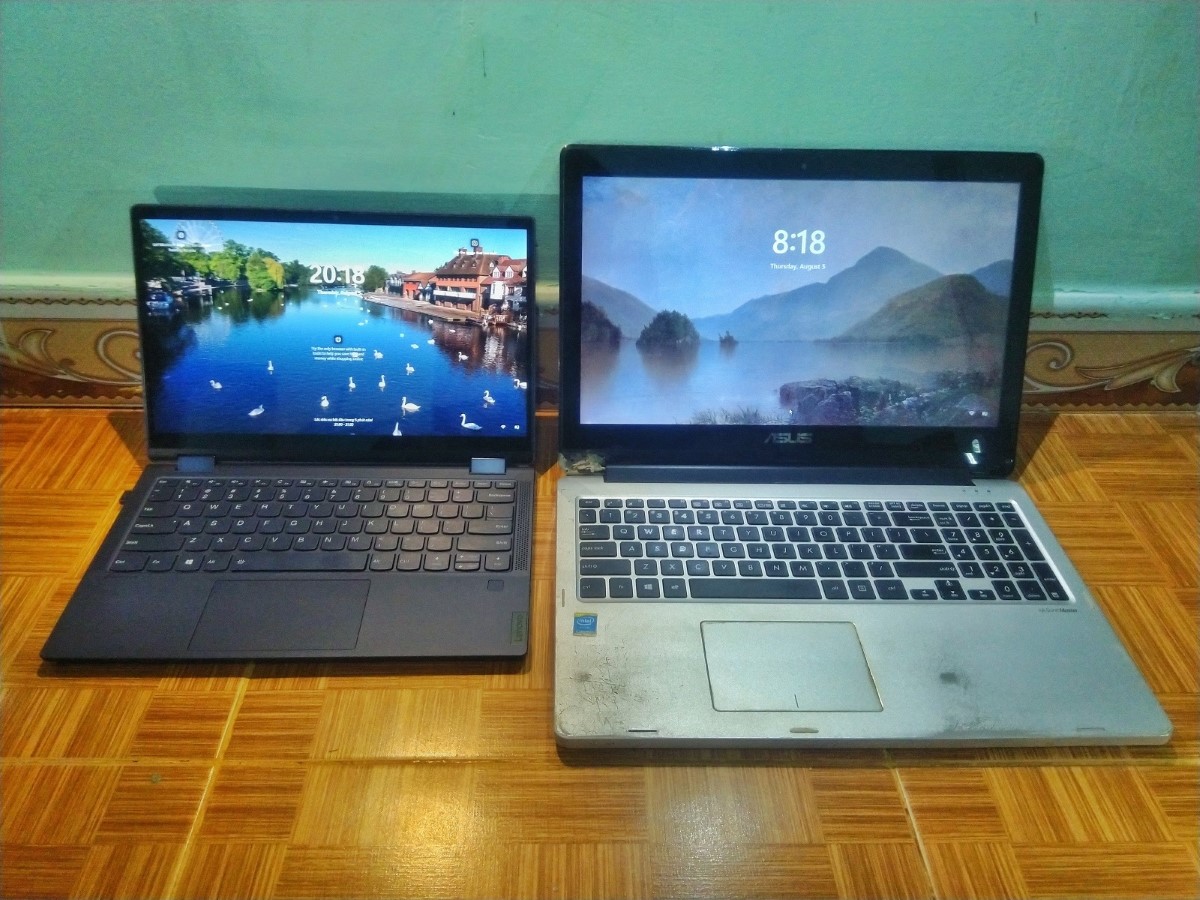 Trong ảnh là hai chiếc máy tính laptop. Từ trái sang: Lenovo Yoga 6 và ASUS TP500LA.